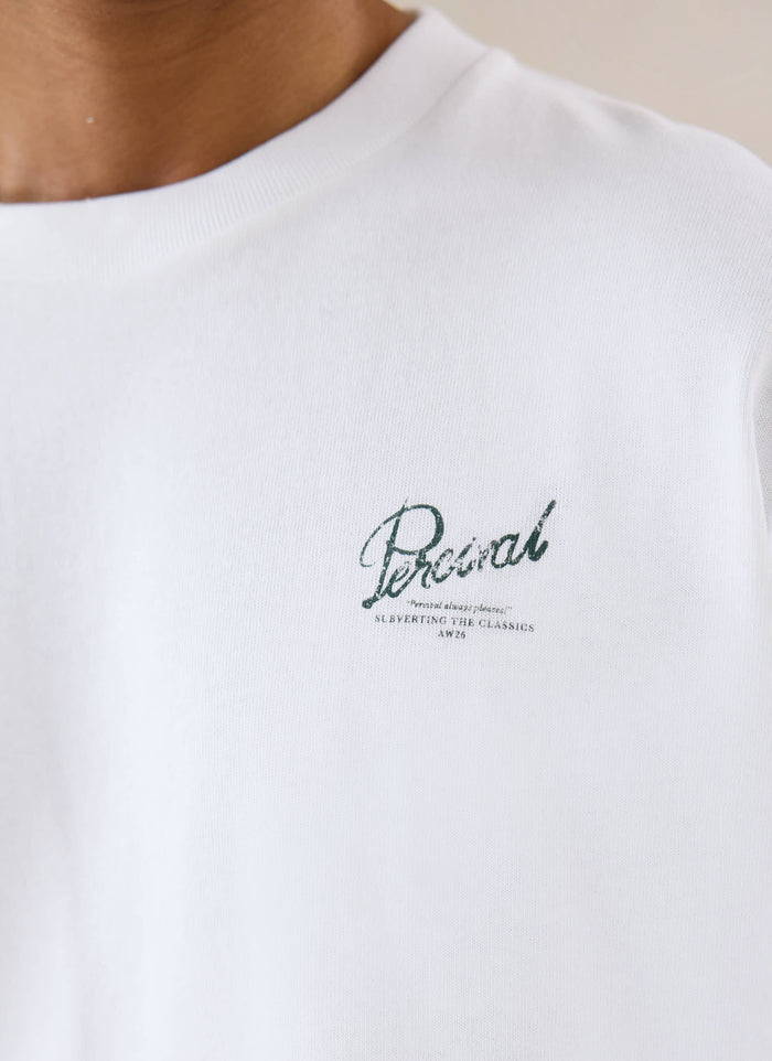 Close-up of a model wearing the white Percival Marley T-Shirt, highlighting the detailed chest graphic and text.