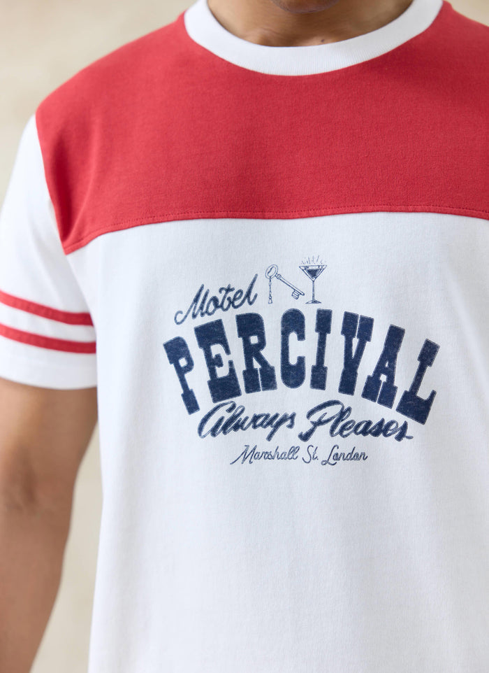 Close-up of the Motel Percival graphic on a white organic cotton t-shirt with a red contrast yoke and sleeve stripes.