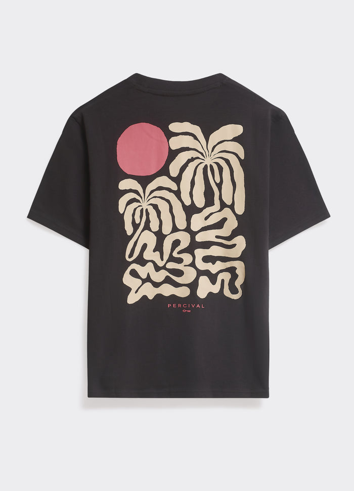 The Percival Palms T-Shirt in washed black, featuring a large hand-drawn cream palm and rosy sun graphic on the back.