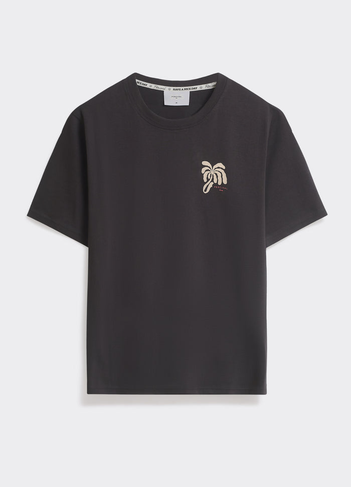 The Percival Palms T-Shirt in washed black, a cotton jersey crew neck featuring a small palm tree chest print.