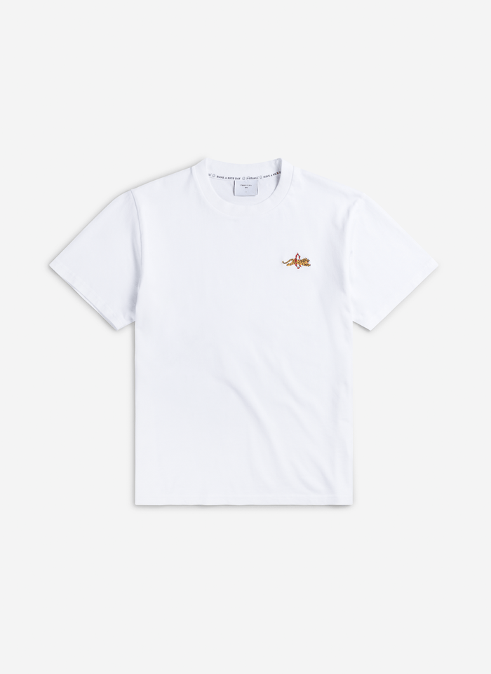 The Percival Tiger T-shirt in white organic cotton, laid flat to show the embroidered tiger detail on the chest.
